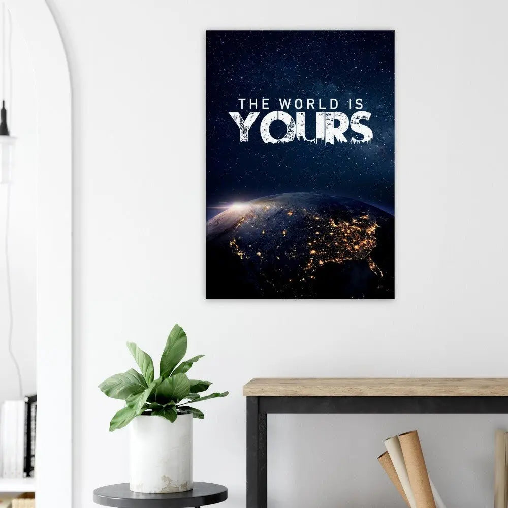 The World Is Yours motivational canvas print, on a light wall above a sideboard